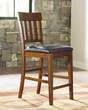 Auburndale Furniture Outlet - Ashley Furniture - Ralene Dining Room - Counter Height Bar Stool (Set of 2) / Medium Brown - D594-124X2