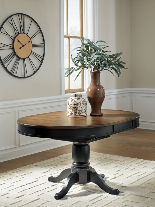 Auburndale Furniture Outlet - Ashley Furniture - Clorazi Dining Room - Oval DRM Butterfly EXT Table - PCD619-48