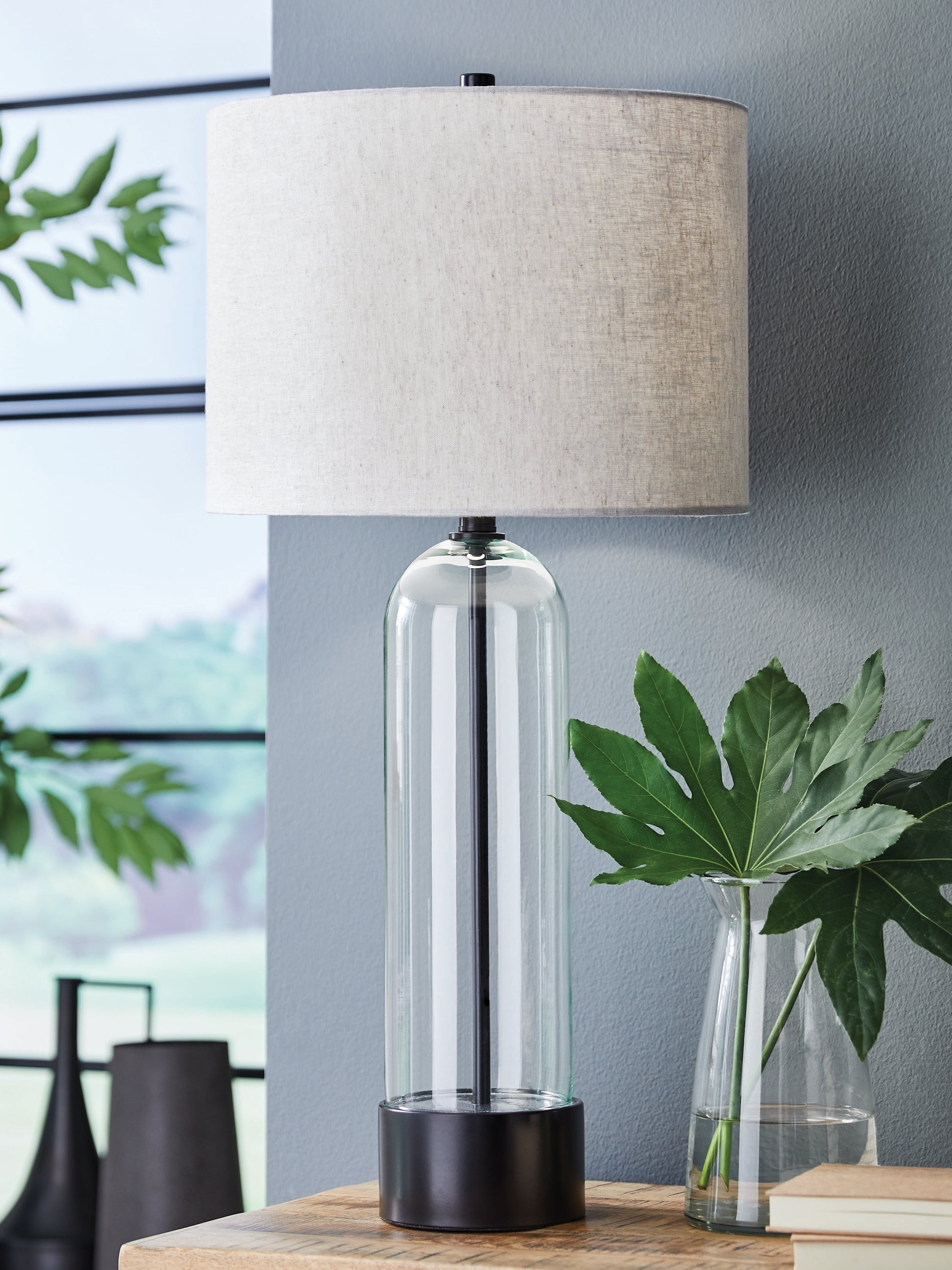 Auburndale Furniture Outlet - Ashley Furniture - Kerrbrook Lighting - Glass Table Lamp (1/CN) / Clear/Black - L430944