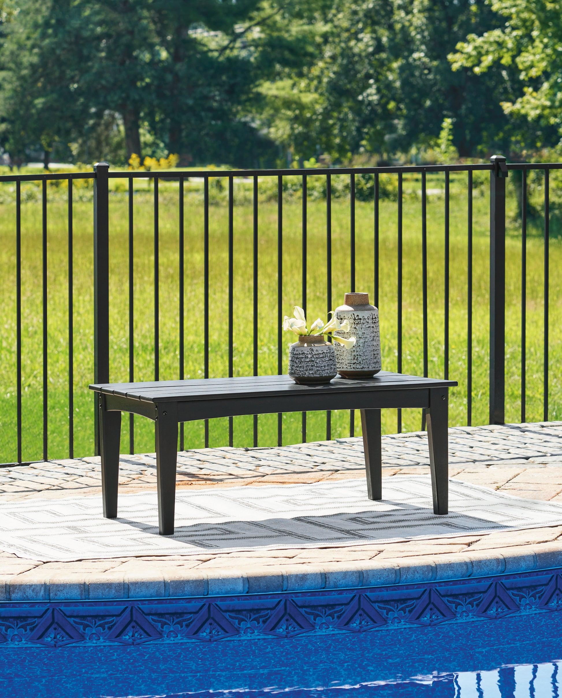Auburndale Furniture Outlet - Ashley Furniture - Hyland wave Outdoor - Rectangular Cocktail Table / Black - P108-701