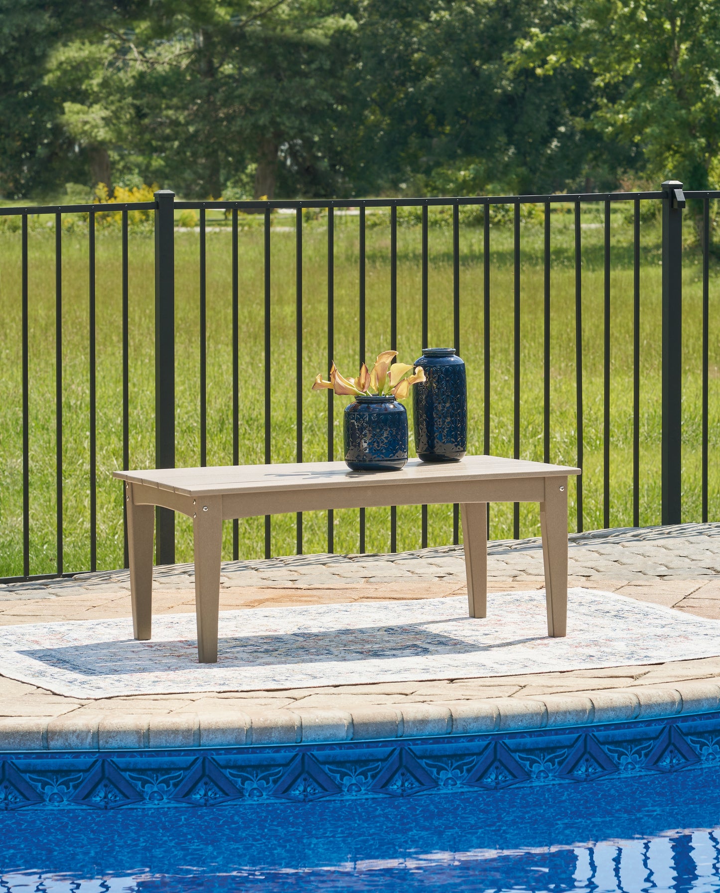 Auburndale Furniture Outlet - Ashley Furniture - Hyland wave Outdoor - Rectangular Cocktail Table / Driftwood - P114-701