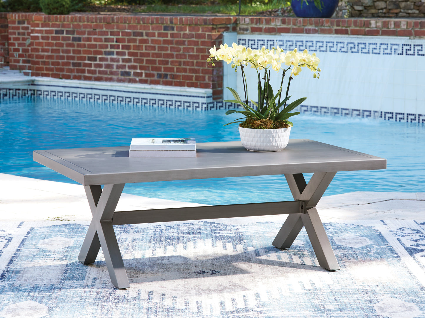Auburndale Furniture Outlet - Ashley Furniture - Half Moon Beach Outdoor - Rectangular Cocktail Table / Gray - PCP418-701