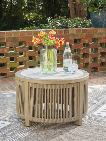 Auburndale Furniture Outlet - Ashley Furniture - Spooners Cove Outdoor - Round Cocktail Table / Beige - PCP469-708