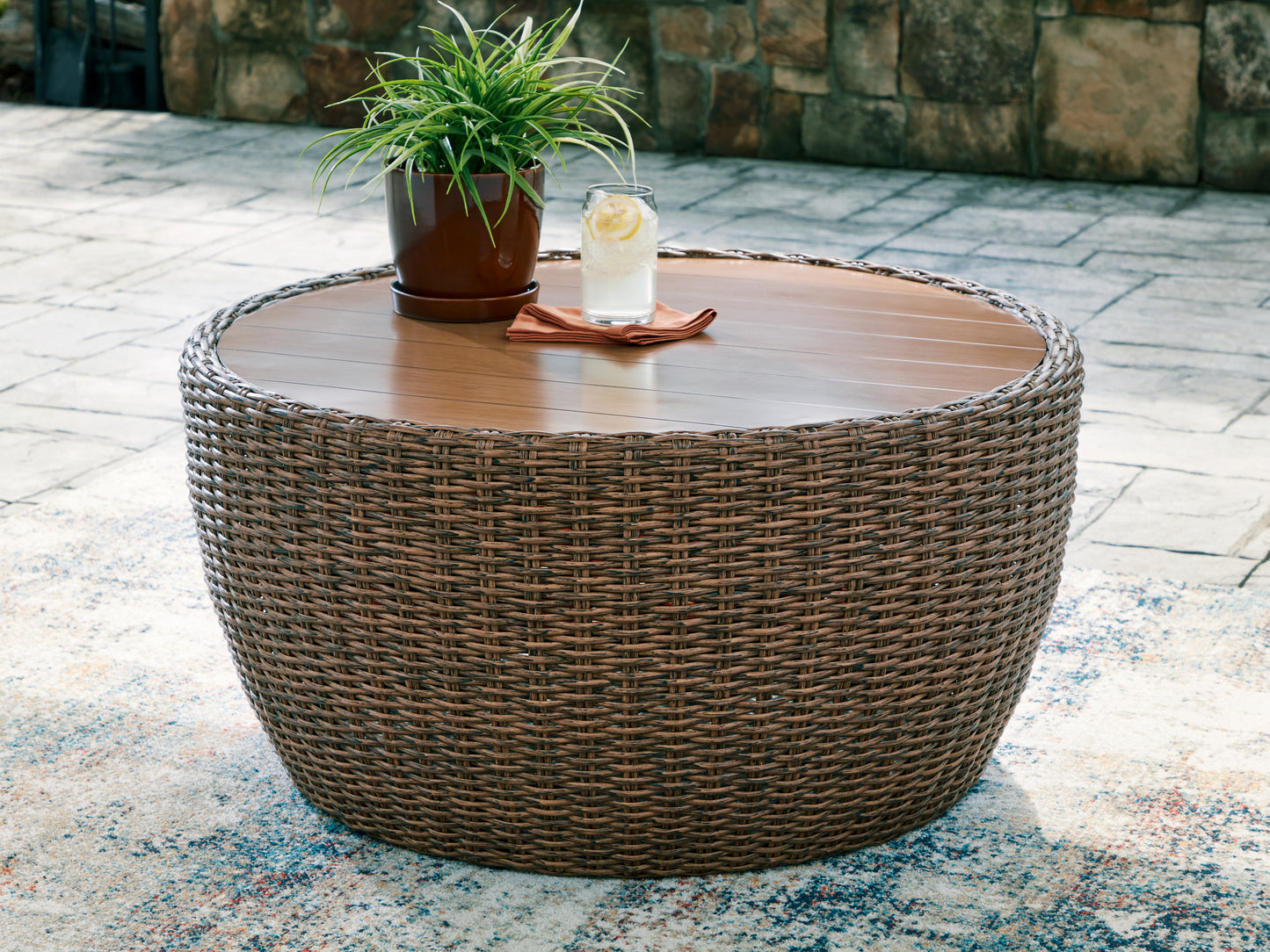 Auburndale Furniture Outlet - Ashley Furniture - Double Point Outdoor - Round Cocktail Table / Beige - PCP503-708