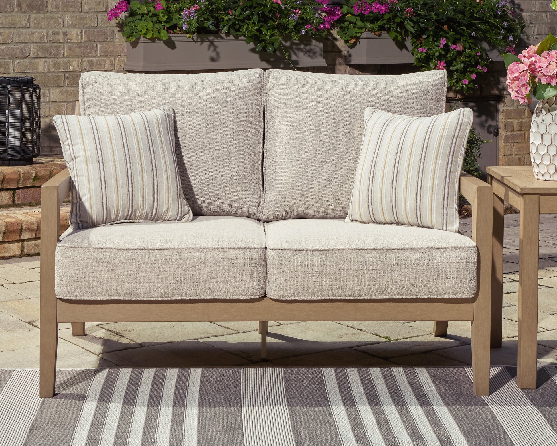Auburndale Furniture Outlet - Ashley Furniture - Hallow Creek Outdoor - Loveseat w/Cushion / Driftwood - P560-835