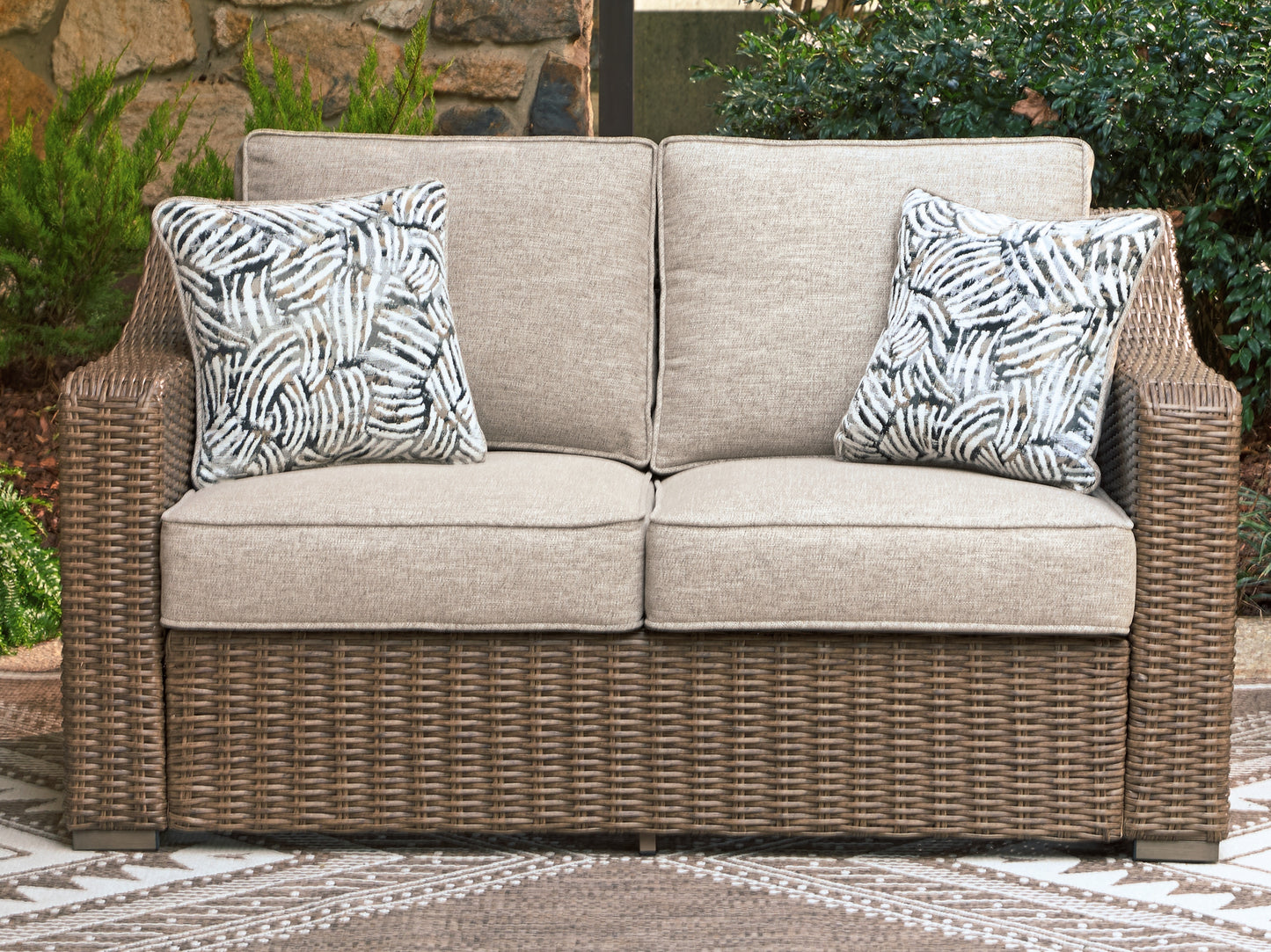 Auburndale Furniture Outlet - Ashley Furniture - Laguna Heights Outdoor - Loveseat w/Cushion / Beige - PCP790-835