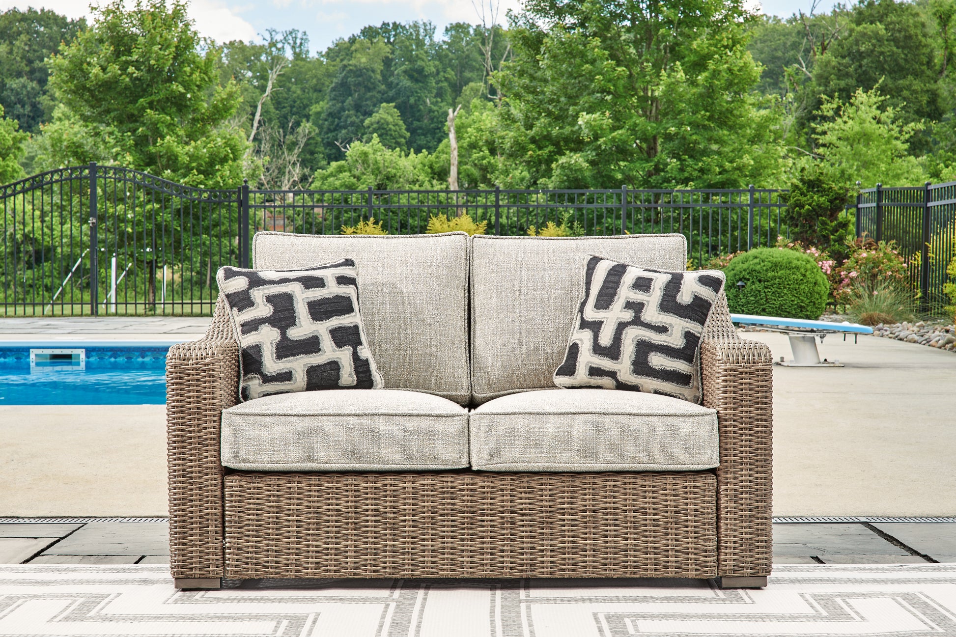 Auburndale Furniture Outlet - Ashley Furniture - Beachcroft Outdoor - Loveseat w/Cushion / Beige - P791-835