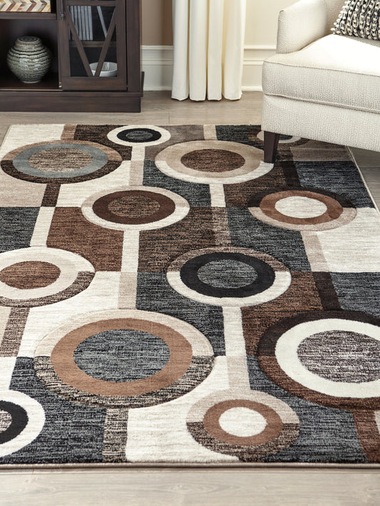 Auburndale Furniture Outlet - Ashley Furniture - Guintte Rug - 5' x 6'7" Rug / Multi - R403972
