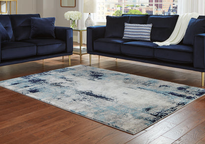 Auburndale Furniture Outlet - Ashley Furniture - Leonelle Rug - 7'10" x 10' Rug / White/Blue/Gray - R404871