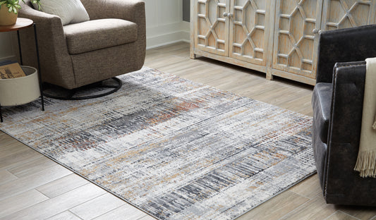 Auburndale Furniture Outlet - Ashley Furniture - Rhettner Rug - 5'3" x 7'3" Rug / Multi - R406072