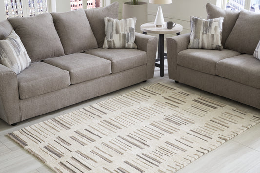 Auburndale Furniture Outlet - Ashley Furniture - Leesdale Rug - 8' x 10' Rug / Ivory/Brown/Black - R406421