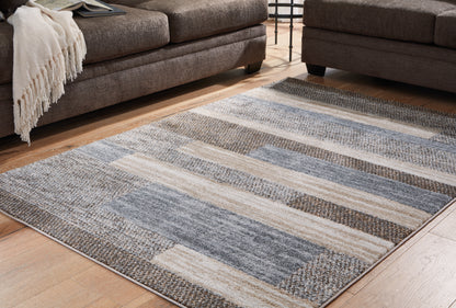 Auburndale Furniture Outlet - Ashley Furniture - Sethburn Rug - 8' x 10' Rug / Cream/Brown/Gray - R406591
