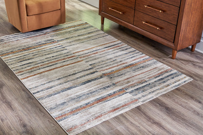 Auburndale Furniture Outlet - Ashley Furniture - Kemart Rug - 5' x 7' Rug / Multi - R406682