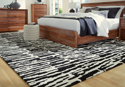 Auburndale Furniture Outlet - Ashley Furniture - Bramshaw Rug - 5' x 7' Rug / Black/Ivory - R406762