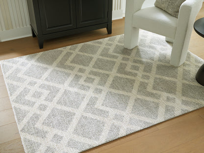 Auburndale Furniture Outlet - Ashley Furniture - Unawick Rug - Medium Rug / Gray/Ivory - R407332