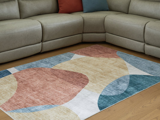 Auburndale Furniture Outlet - Ashley Furniture - Chanleigh Rug - Washable 5' x 7' Area Rug / Multi - R407372