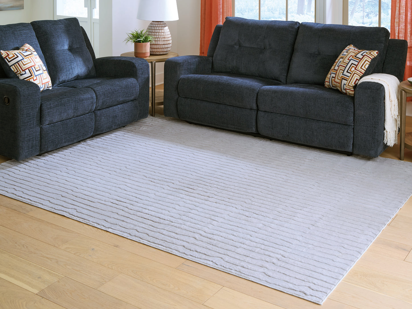 Auburndale Furniture Outlet - Ashley Furniture - Worthley Rug - Washable 8' x 10' Area Rug / Gray - R407451