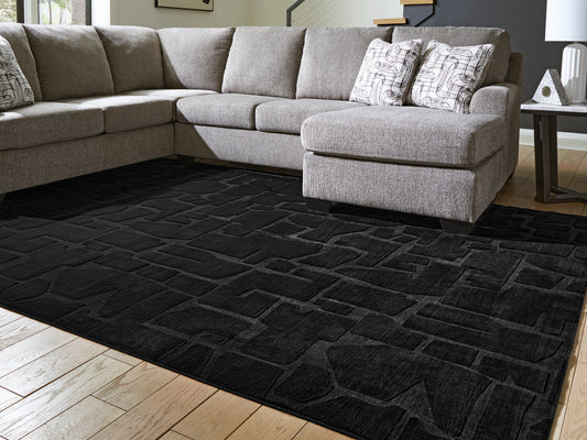 Auburndale Furniture Outlet - Ashley Furniture - Gibbswell Rug - Washable 8' x 10' Area Rug / Black - R407461