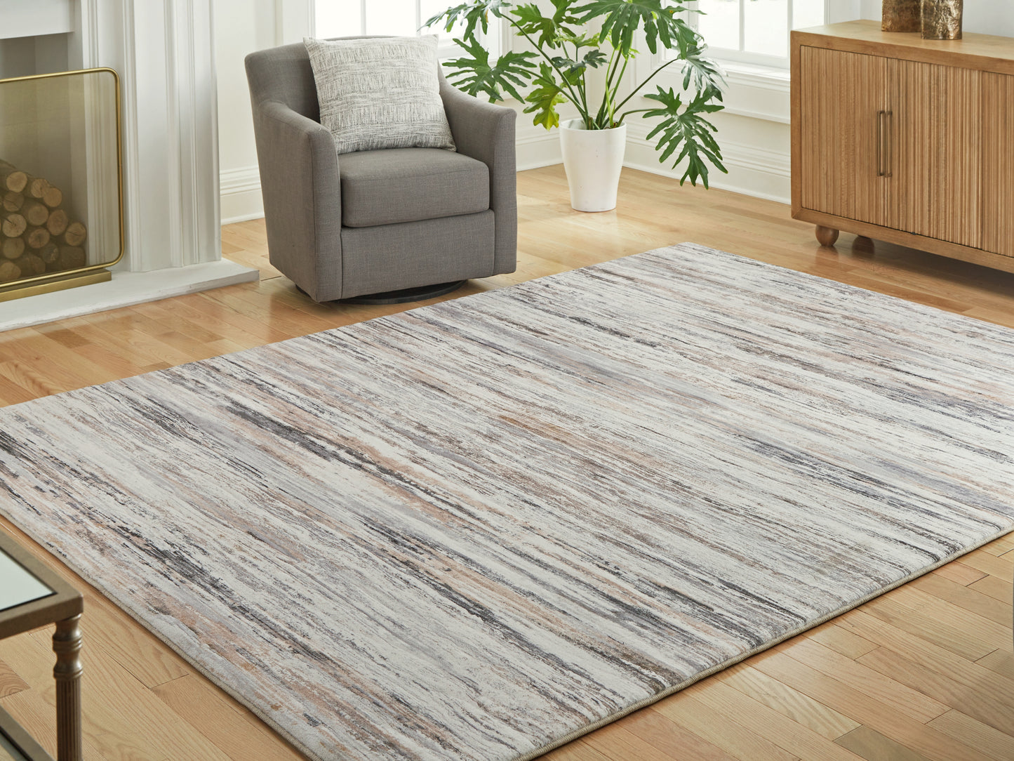 Auburndale Furniture Outlet - Ashley Furniture - Nace Rug - 7'6" x 9'6" Area Rug / Gray/Brown/White - R407471