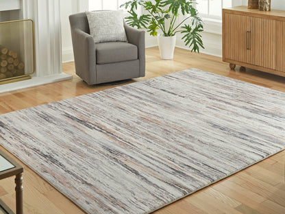 Auburndale Furniture Outlet - Ashley Furniture - Nace Rug - 7'6" x 9'6" Area Rug / Gray/Brown/White - R407471