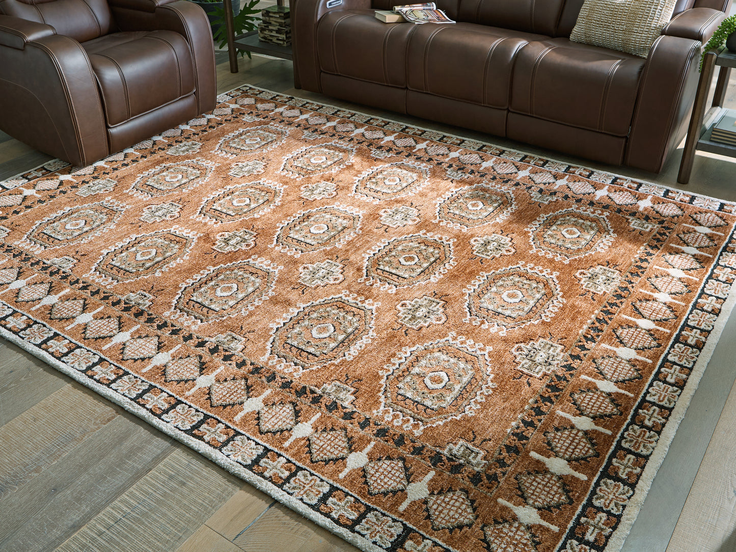 Auburndale Furniture Outlet - Ashley Furniture - Qaabiz Rug - 7'8" x 10' Area Rug / Sienna/Ivory/Black - R407521