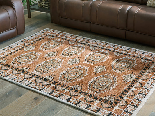 Auburndale Furniture Outlet - Ashley Furniture - Qaabiz Rug - 5' x 7' Area Rug / Sienna/Ivory/Black - R407522