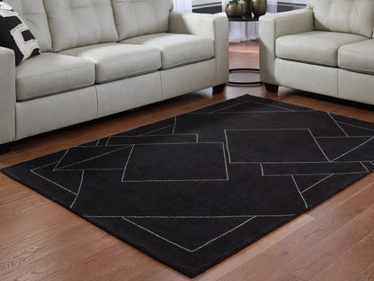 Auburndale Furniture Outlet - Ashley Furniture - Marav Rug - 5' x 7' Area Rug / Black/White - R407532