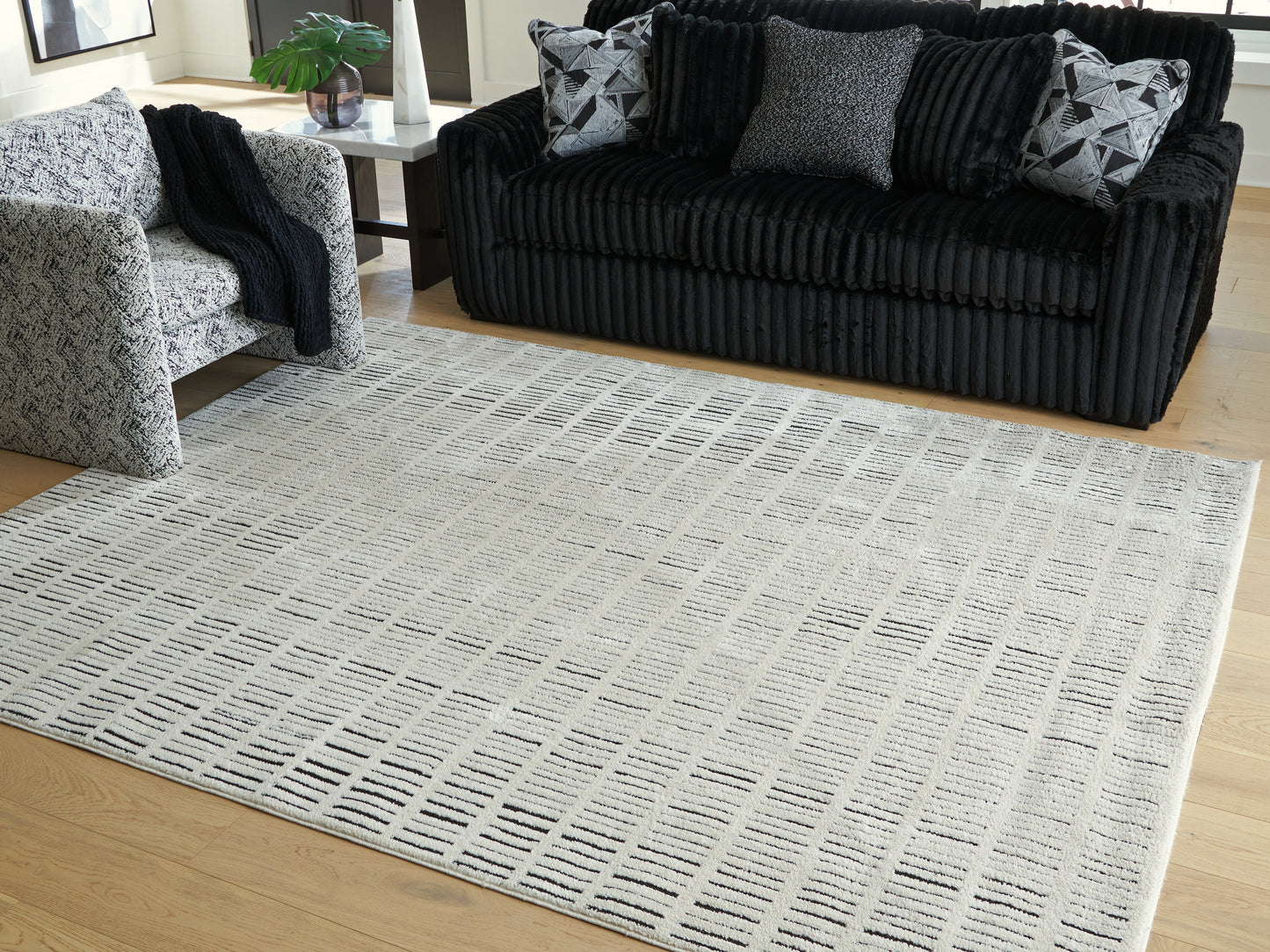 Auburndale Furniture Outlet - Ashley Furniture - Turinwith Rug - 7'10" x 9'10" Area Rug / Ivory/Black - R407551