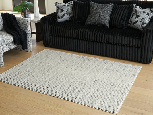 Auburndale Furniture Outlet - Ashley Furniture - Turinwith Rug - 7'10" x 9'10" Area Rug / Ivory/Black - R407551