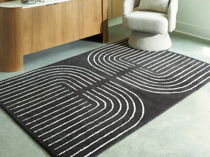 Auburndale Furniture Outlet - Ashley Furniture - Eldonmore Rug - 7'8" x 10' Area Rug / Black/Ivory - R407571