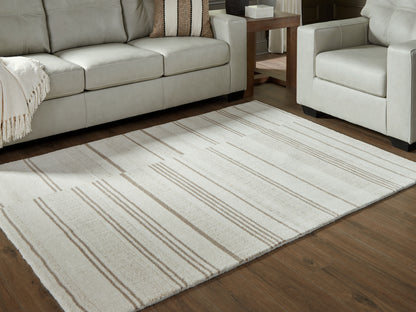 Auburndale Furniture Outlet - Ashley Furniture - Gadence Rug - 5' x 7' Area Rug / Ivory/Tan - R407642