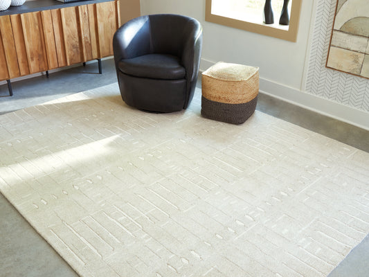 Auburndale Furniture Outlet - Ashley Furniture - Wolbert Rug - 7'8" x 10' Area Rug / Tan/Ivory - R407661