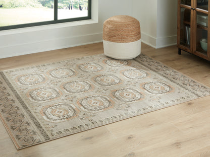 Auburndale Furniture Outlet - Ashley Furniture - Bachby Rug - 5'3" x 7' Area Rug / Multi - R407682
