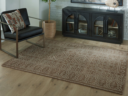 Auburndale Furniture Outlet - Ashley Furniture - Merrittman Rug - 5' x 7' Area Rug / Brown/Ivory - R407702