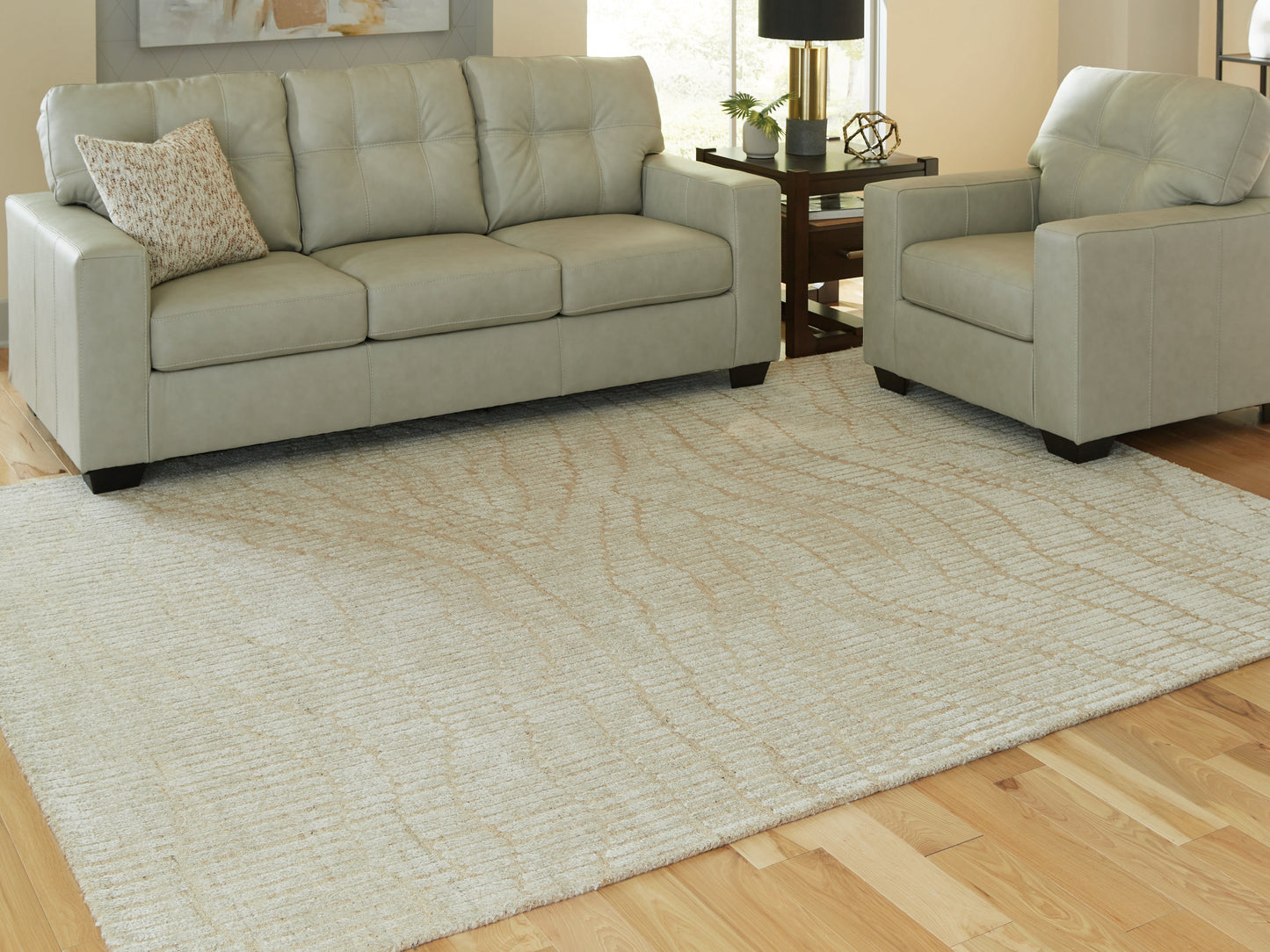 Auburndale Furniture Outlet - Ashley Furniture - Jaseena Rug - 7'8" x 10' Area Rug / Beige/Tan - R407721
