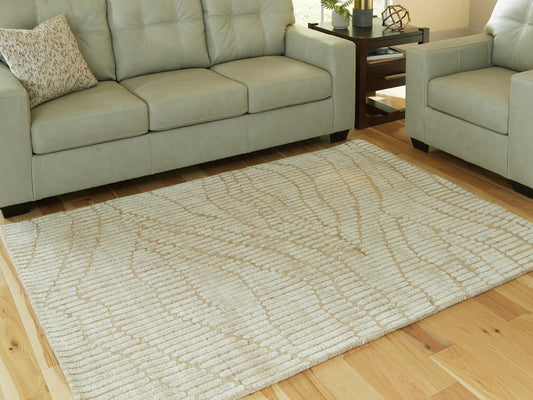 Auburndale Furniture Outlet - Ashley Furniture - Jaseena Rug - 5' x 7' Area Rug / Beige/Tan - R407722