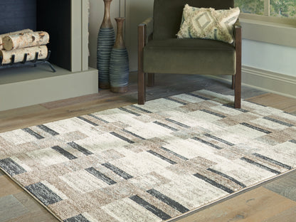 Auburndale Furniture Outlet - Ashley Furniture - Alstone Rug - 7'10" x 10' Area Rug / Multi - R407731