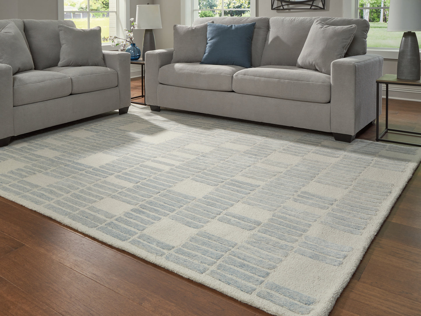Auburndale Furniture Outlet - Ashley Furniture - Dylanton Rug - 7'8" x 10' Area Rug / Ivory/Blue - R407811