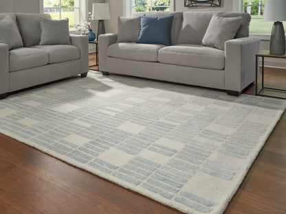 Auburndale Furniture Outlet - Ashley Furniture - Dylanton Rug - 7'8" x 10' Area Rug / Ivory/Blue - R407811