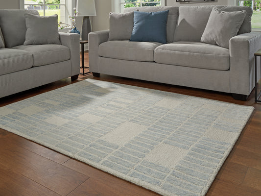 Auburndale Furniture Outlet - Ashley Furniture - Dylanton Rug - 5' x 7' Area Rug / Ivory/Blue - R407812