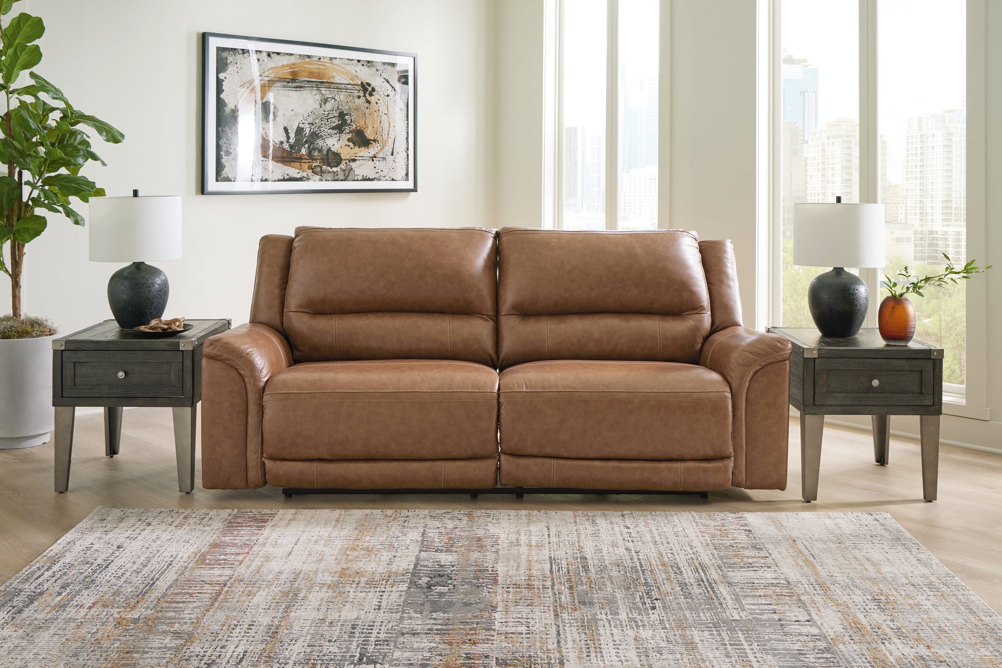 Auburndale Furniture Outlet - Ashley Furniture - Trasimeno Living Room - PWR Recliner/ADJ Headrest / Caramel - U8281513