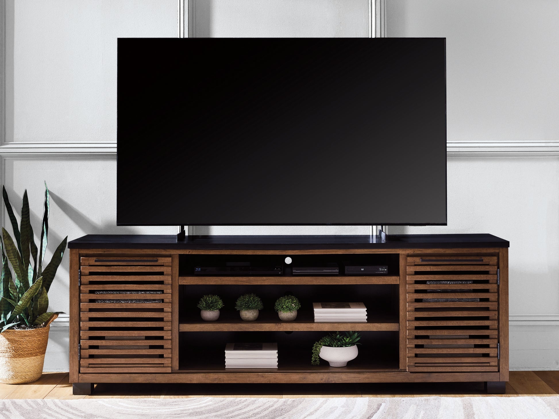 Auburndale Furniture Outlet - Ashley Furniture - Kallari 84" TV Stand - 84" / Warm Brown/Black - W737-78